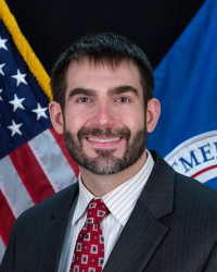 A headshot of Mr. John Richardson