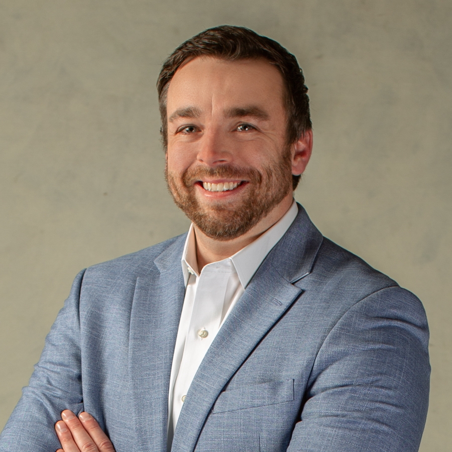 A headshot of Graham Evans